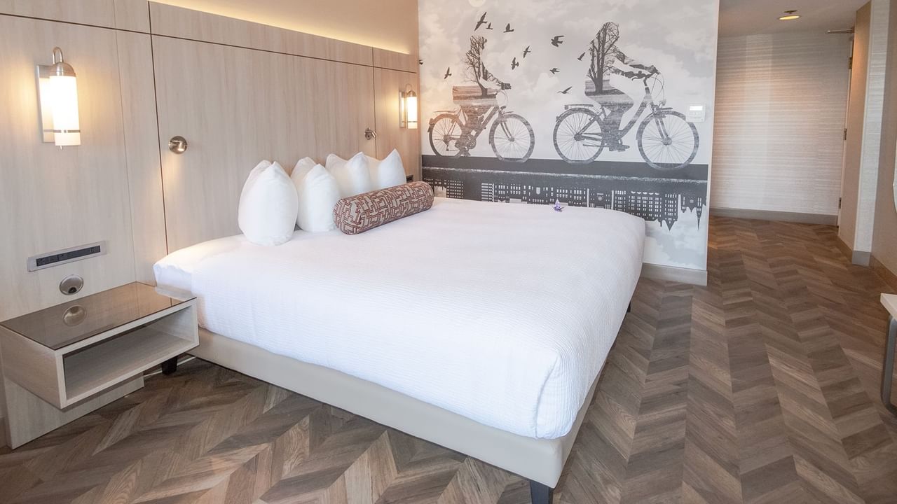 Hotel guestroom with a king size bed