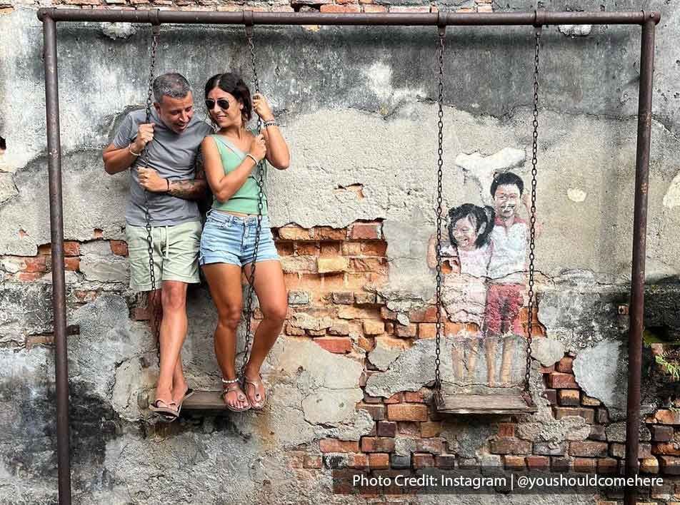 Penang Street Art: Brother and Sister on a Swing - Lexis Suites Penang