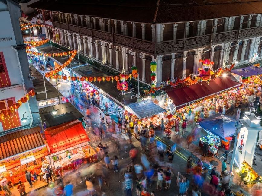 Aerial view of Chinatown at night with lanterns & decorations near Nostalgia Hotel Singapore