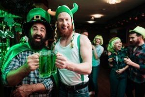 2 men in carnival hats toasting beer, Bar, Rosen Inn Universal