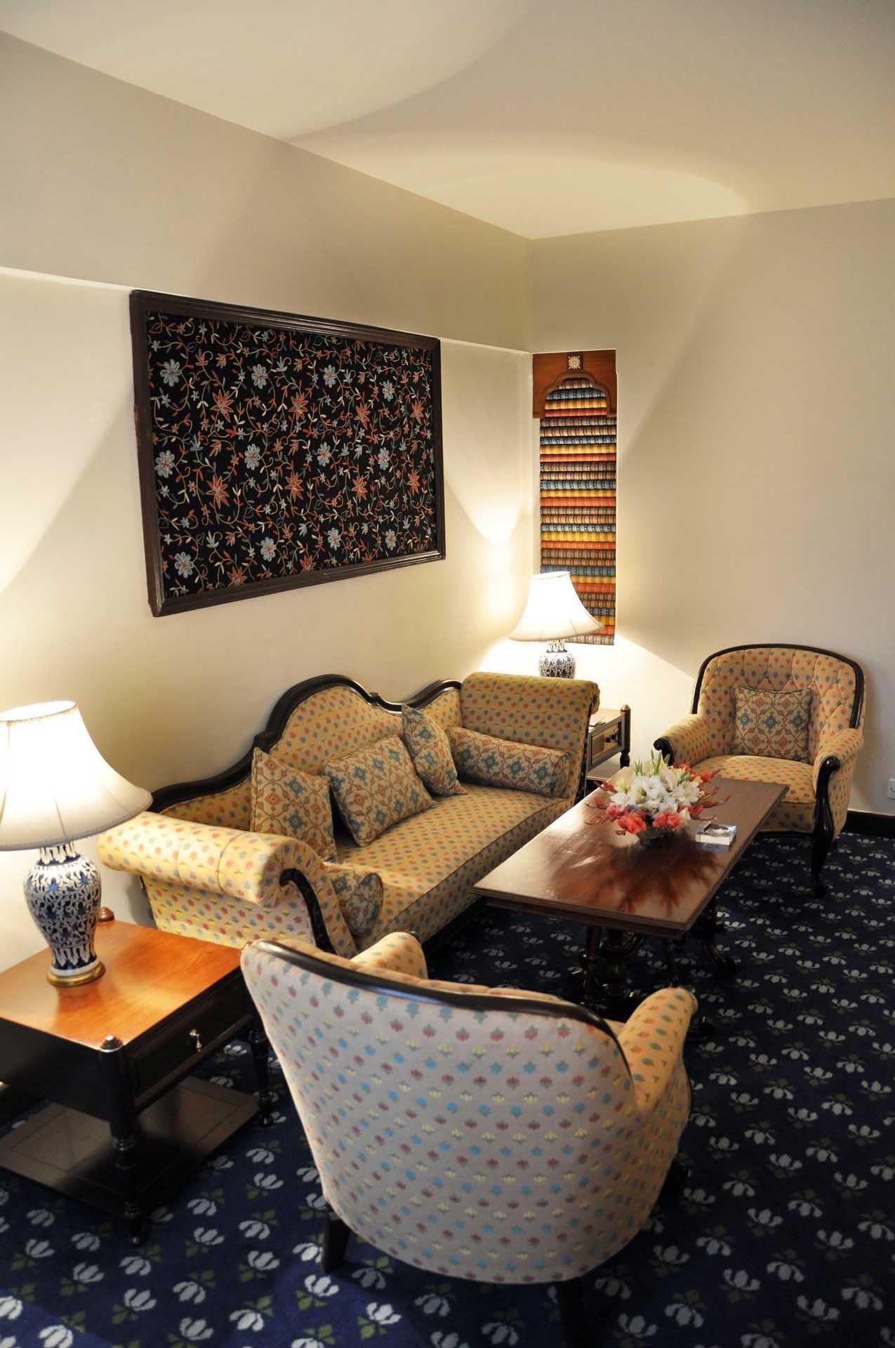 Lounge area in a Hotel room at Faisalabad Serena Hotel