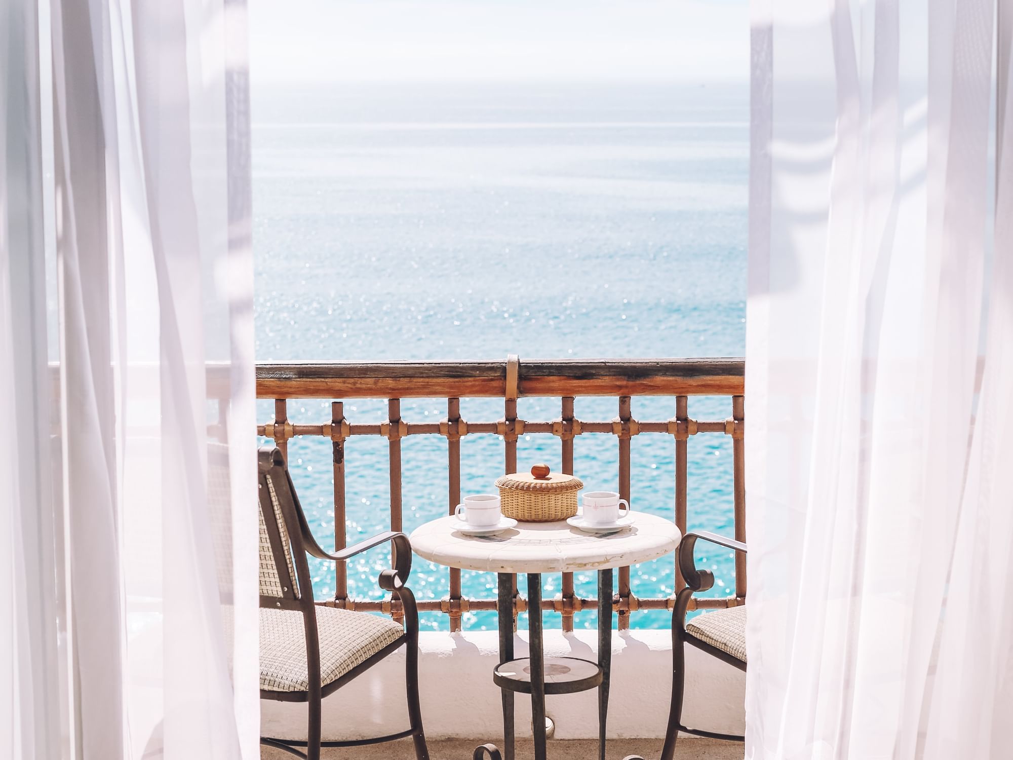 Dining setup on a balcony in a room at Marquis Los Cabos