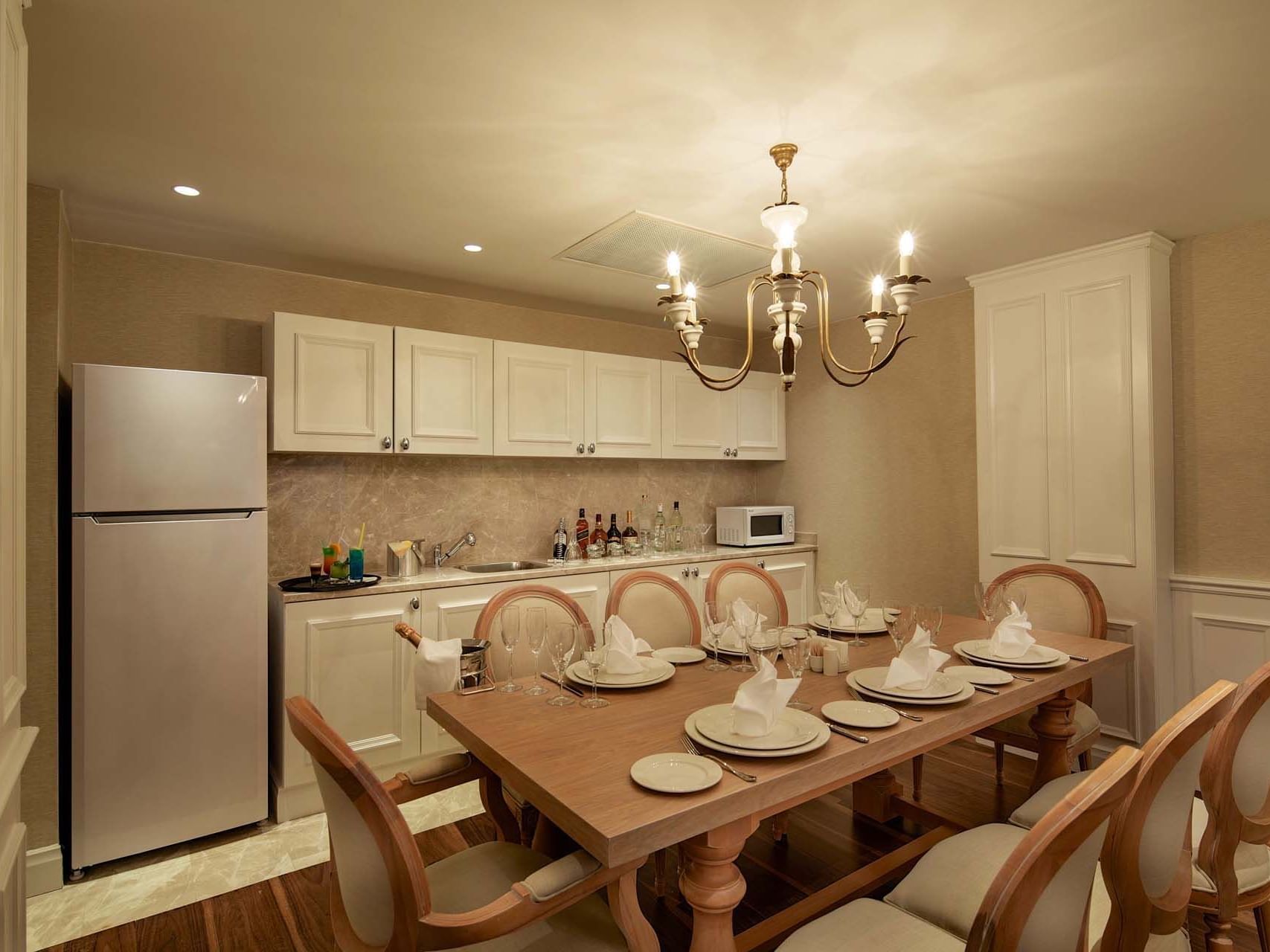 Dining table by the kitchen area in Superior Villa at Titanic Deluxe Golf Belek