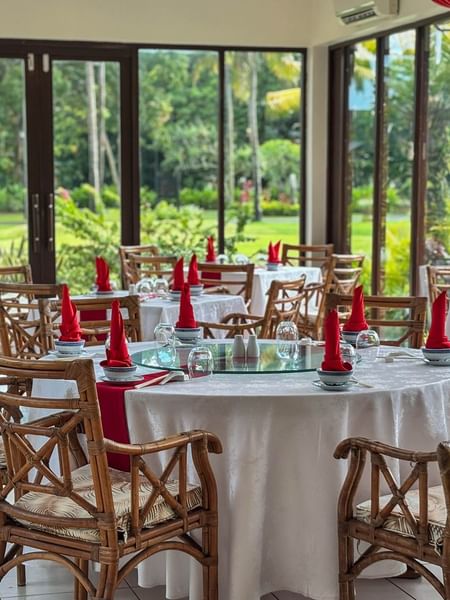 Bamboo Terrace dining area with bamboo chairs at The Naviti Resort - Fiji.