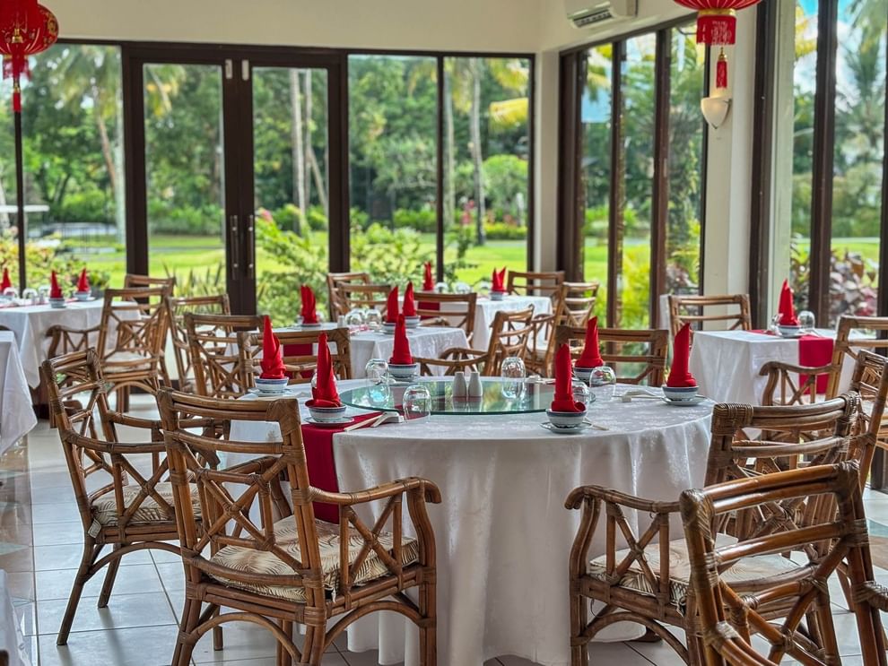 Bamboo Terrace dining area with bamboo chairs at The Naviti Resort - Fiji.