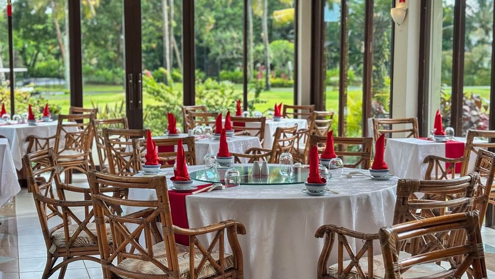 Bamboo Terrace dining area with bamboo chairs at The Naviti Resort - Fiji.