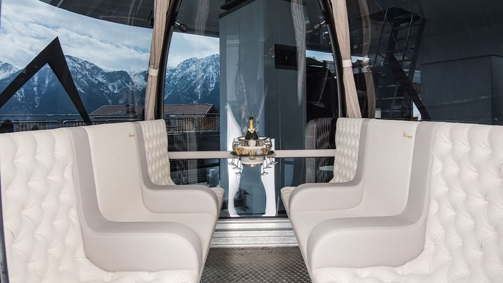 Seating area in a VIP cable car near Falkensteiner Hotel Kronplatz