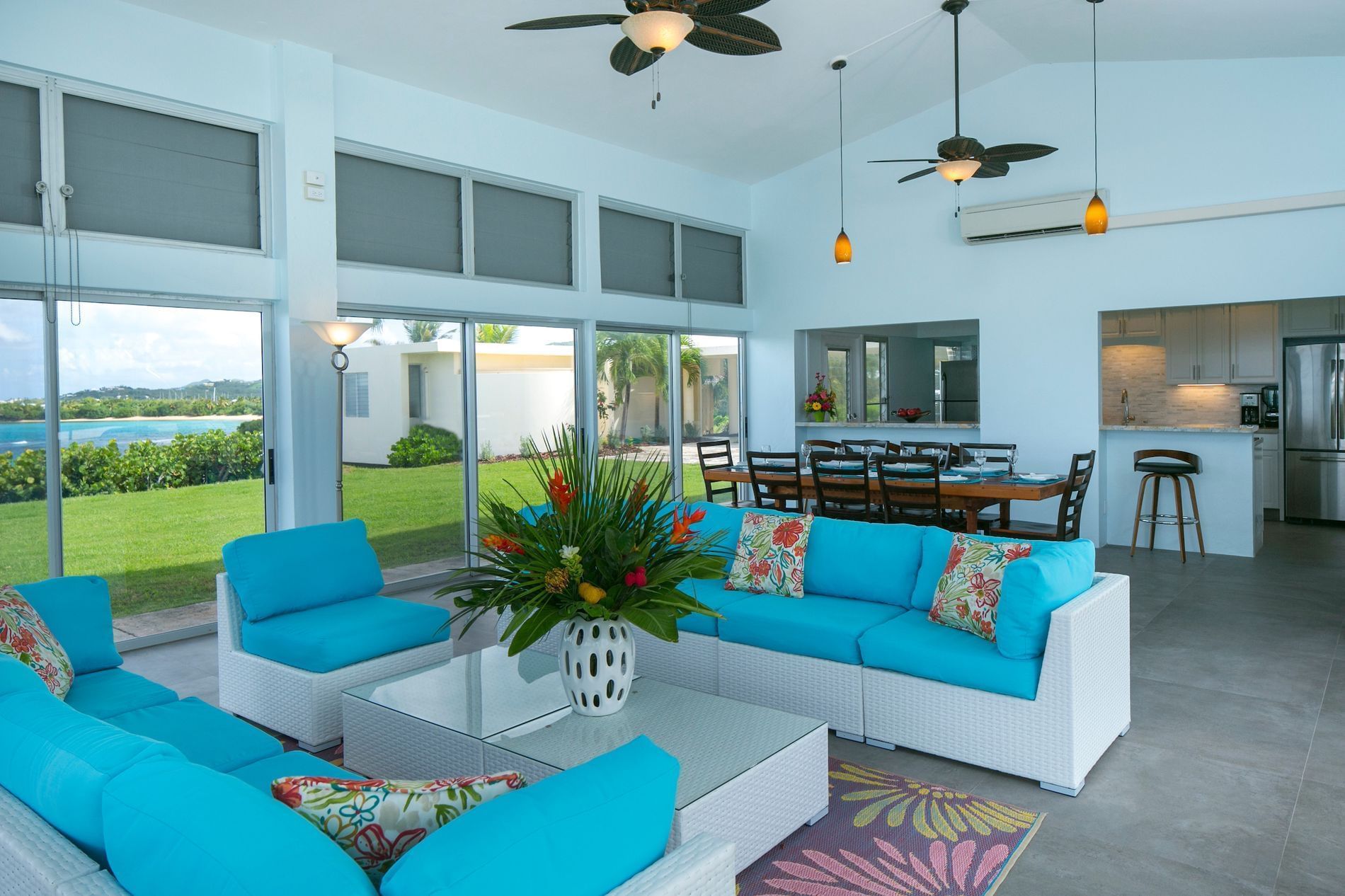 Suite living and dining area with a Sea view at The Buccaneer Resort St. Croix