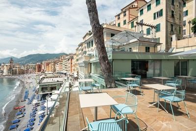 Informal table set-up on terrace at Sublimis Boutique Hotel Camogli