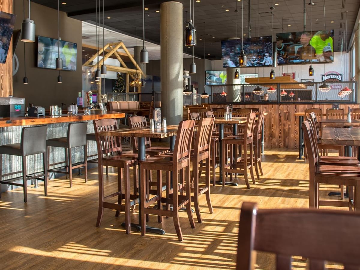 Montana's BBQ & Bar restaurant with TVs and tables.