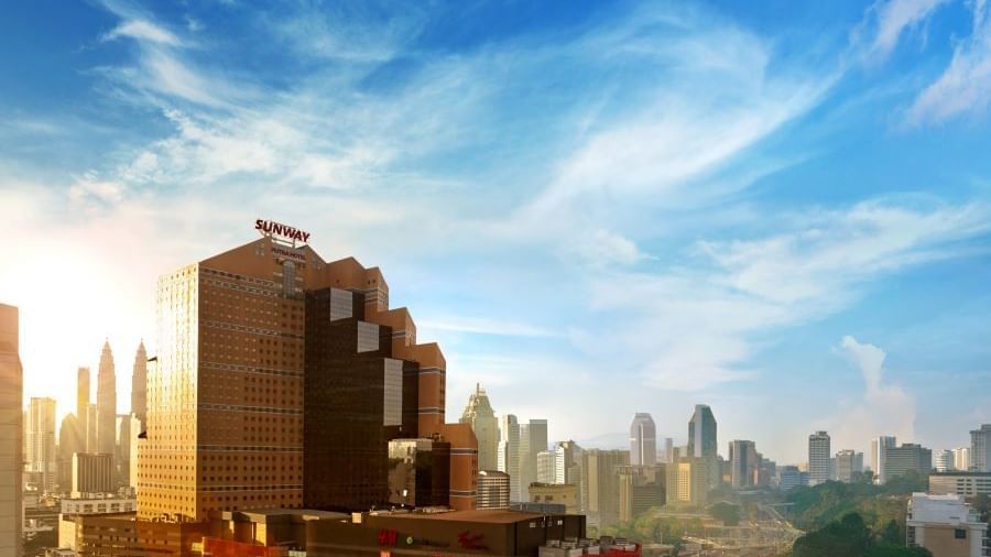 Distant view of the Sunway Putra Hotel & downtown on a sunny day