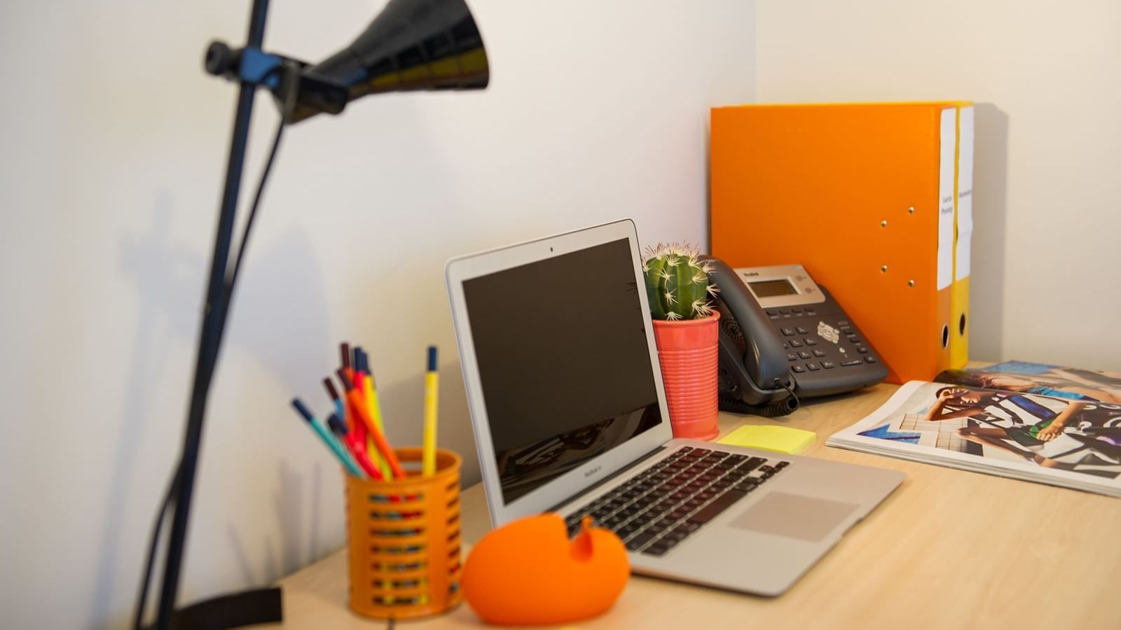 Each apartment includes a large study desk with chair