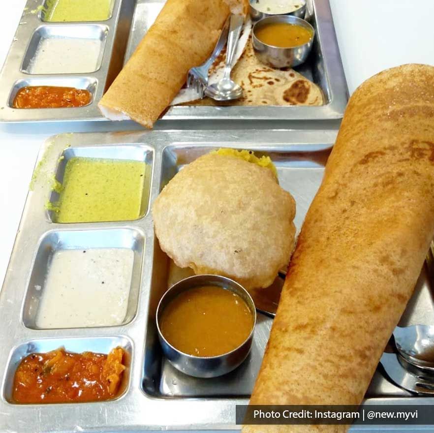 Close-up of a puri and dosa dish served on a street food stall near Imperial Lexis Kuala Lumpur, Jalan Alor best food