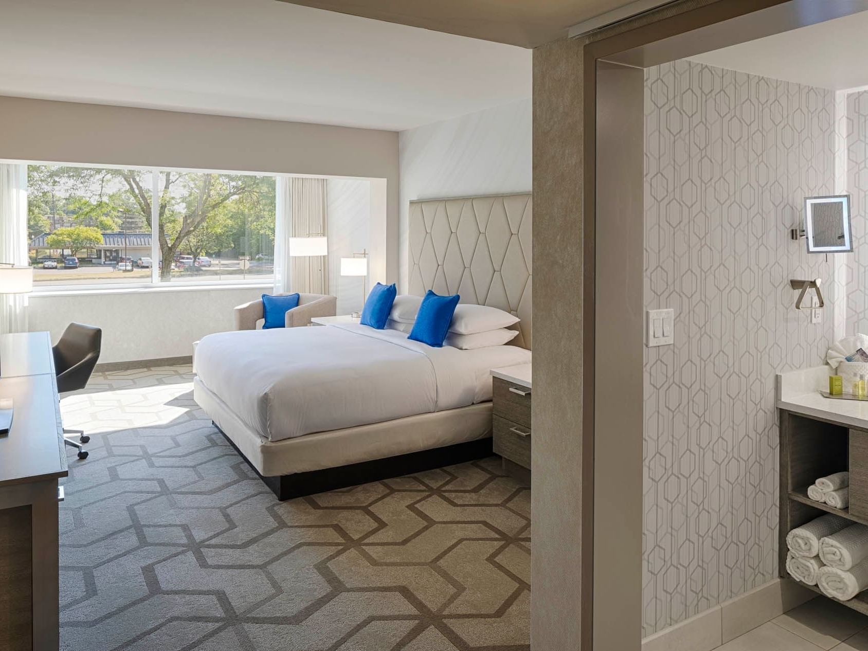Interior of 1 King Deluxe bedroom at Kingsley Bloomfield Hills