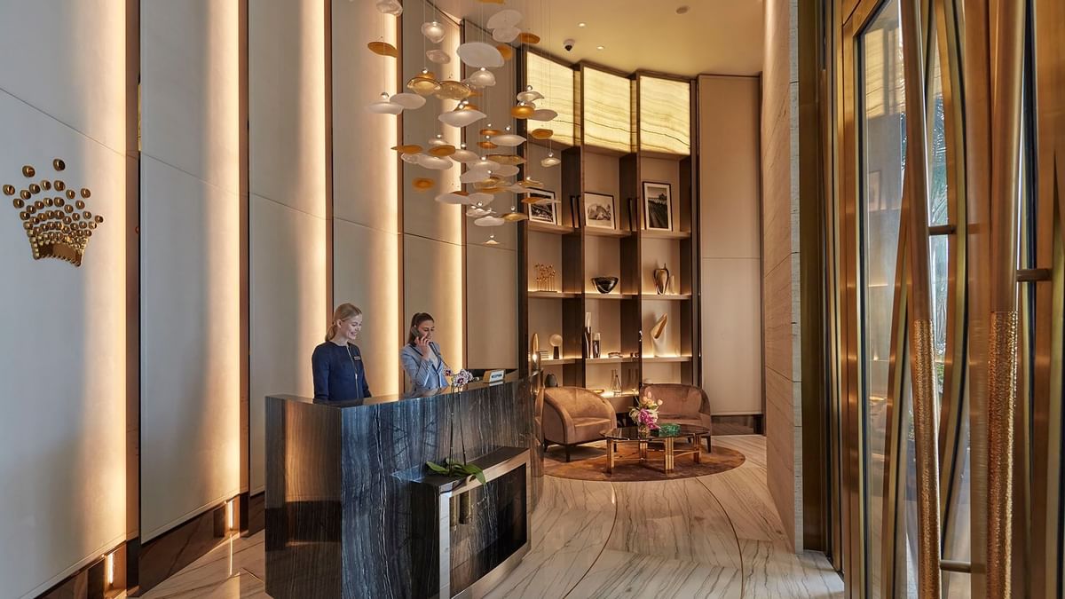 Receptionists at the reception desk in Crown Towers Sydney