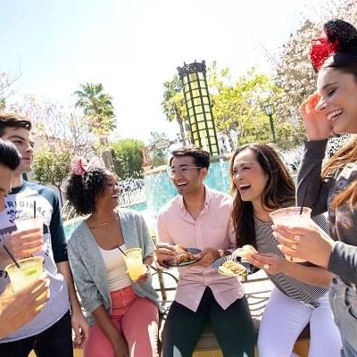 A group of people enjoying drinks at Disneyland