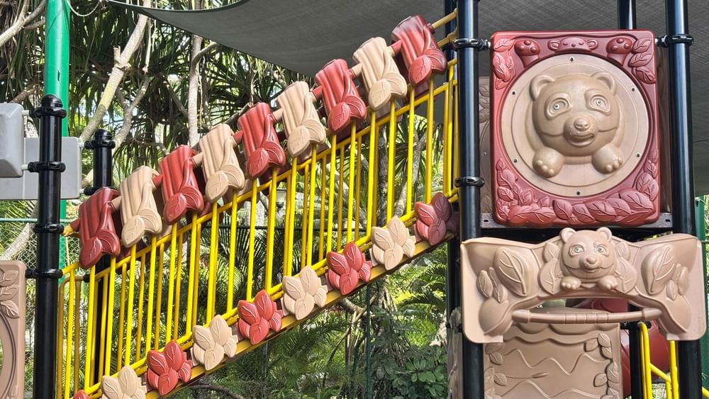 Colorful kids playground with bear designs and a canopy at Warwick Fiji Resort and Spa, Korolevu.