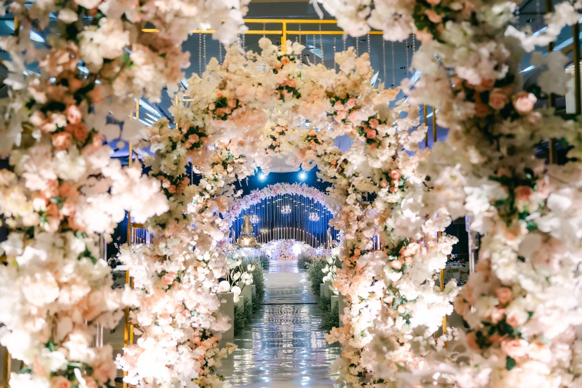 Wedding reception with a floral archway at Po Hotel Semarang