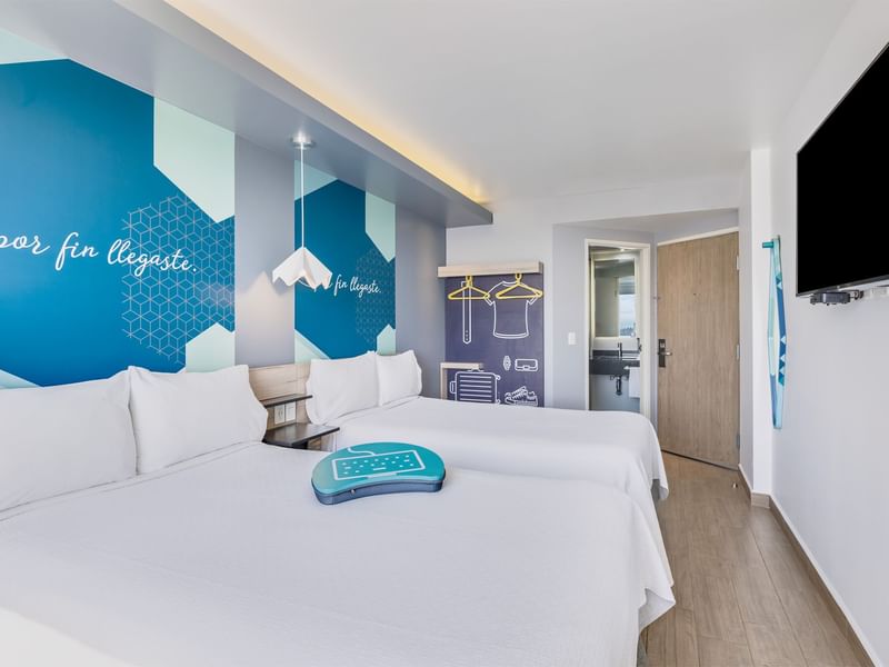 Interior de una Habitación Superior con dos camas en One Hotels