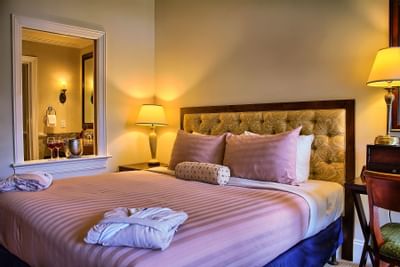 pink bed in hotel room