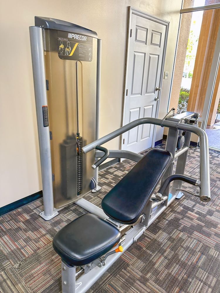 A weight training machine in a fitness room