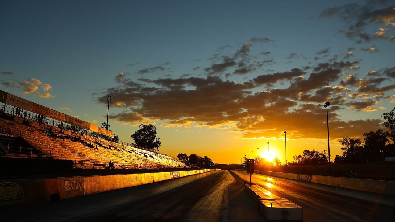 Racing track with sunset in background