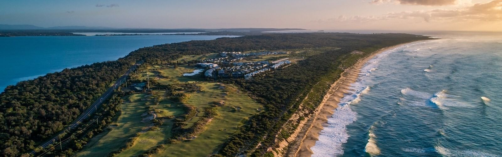 Views from above of beach and golf course Central Coast