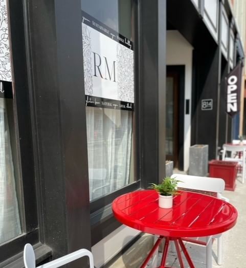 Dining tables in Rose Market outdoors near The Whittaker Inn