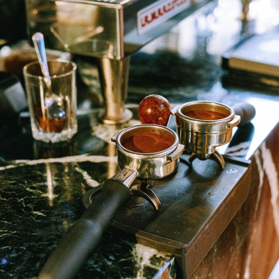 Close-up of a coffee tamper at Honeyrose Hotel