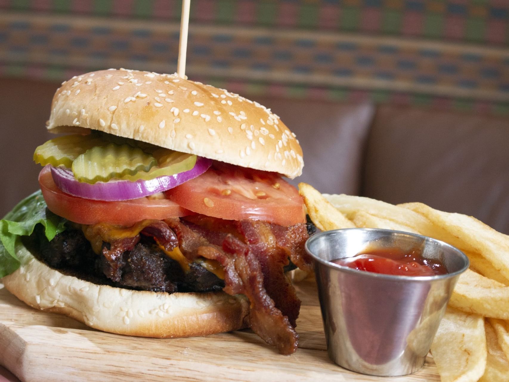 Closeup of a served burger plate at MCM Elegante Hotel O.