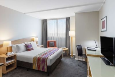 Bedroom interior of One Bedroom Apartments at Nesuto Hotels