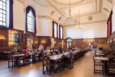 People in The Great Hall at Goodenough Hotel