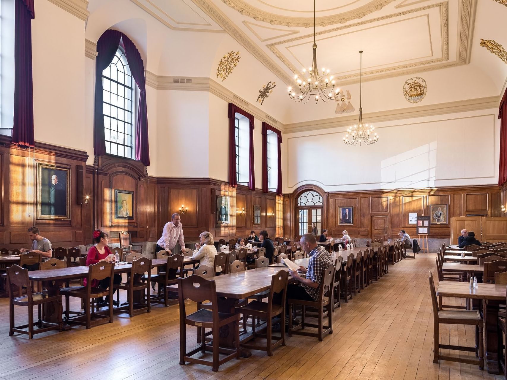 People in Great Hall at The Goodenough Hotel in London