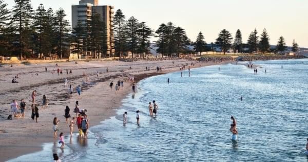 People on Glenelg Beach south of the Jetty.