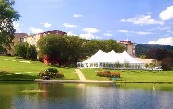 Hotel exterior with the Lakeside tent at Honor’s Haven Retreat