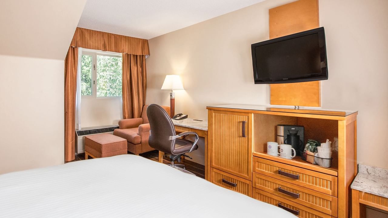 tv with tea and coffee maker