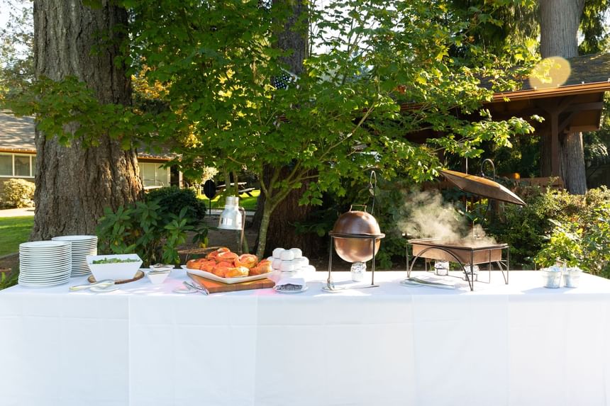 Buffet arranged outdoors by the Cottage Lawn at Alderbrook Resort & Spa