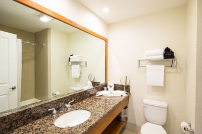 a sink and toilet in a bathroom