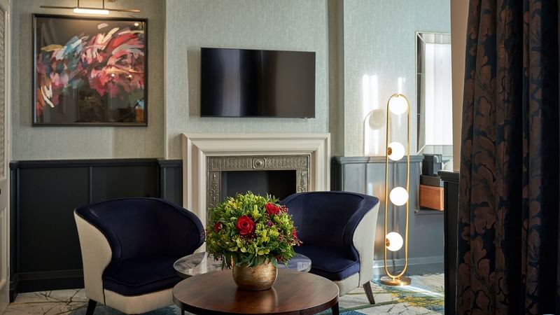 Comfy furniture & artistic architecture in Deluxe lounge area at The Capital Hotel London