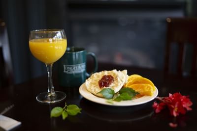 Breakfast sampling with orange juice, coffee, fresh fruit, Engli