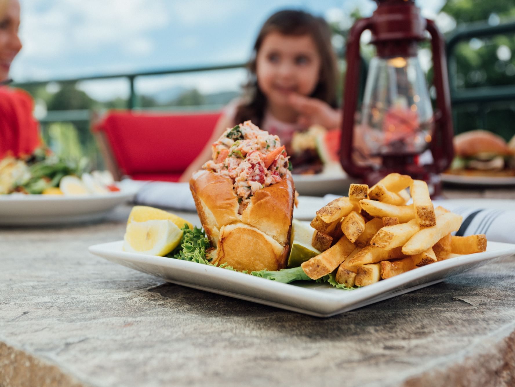 Closeup of served Lobster roll on a table at High Peaks Resort
