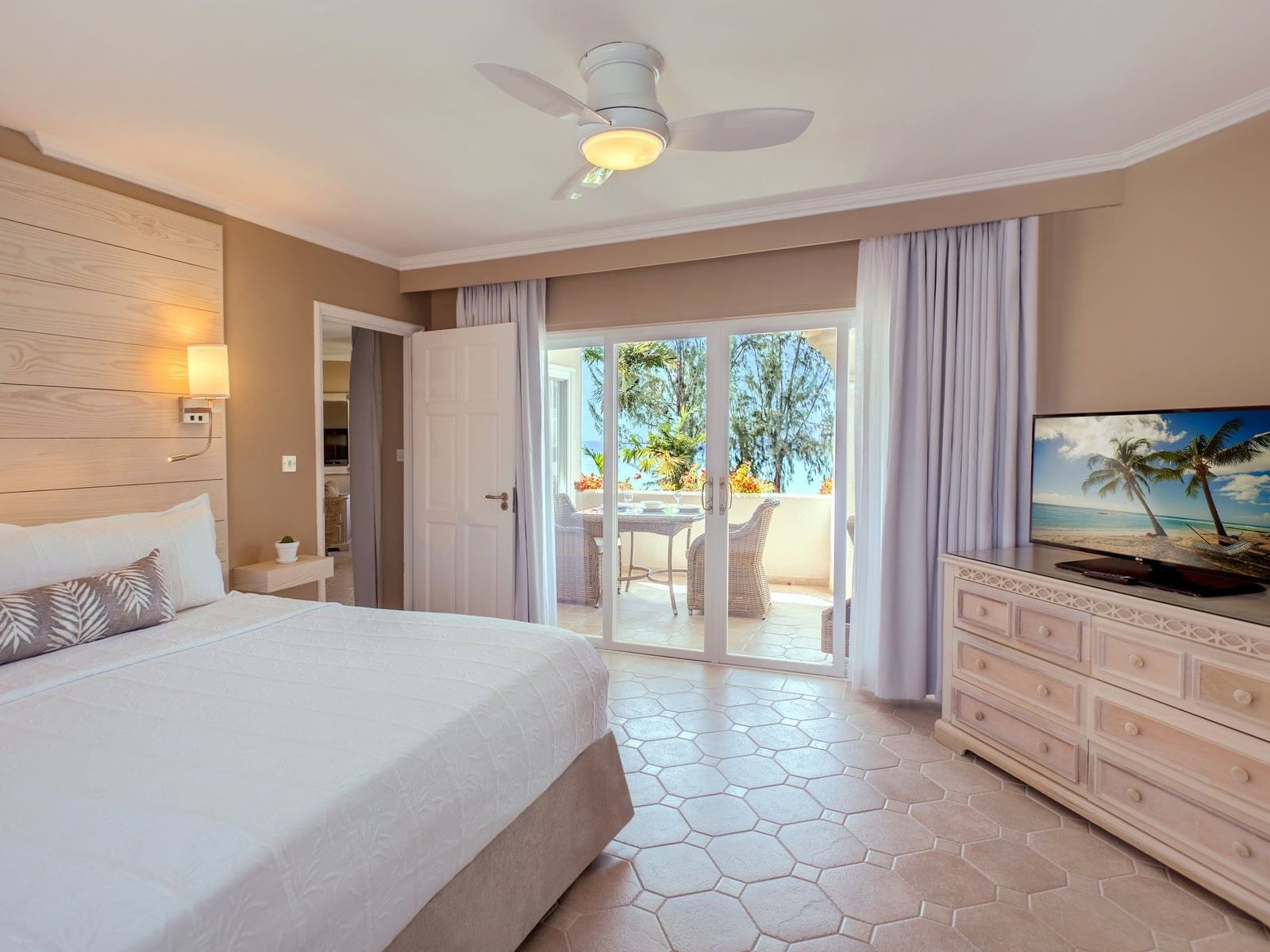 One Bedroom Penthouse with Bed and TV at Bougainvillea Barbados