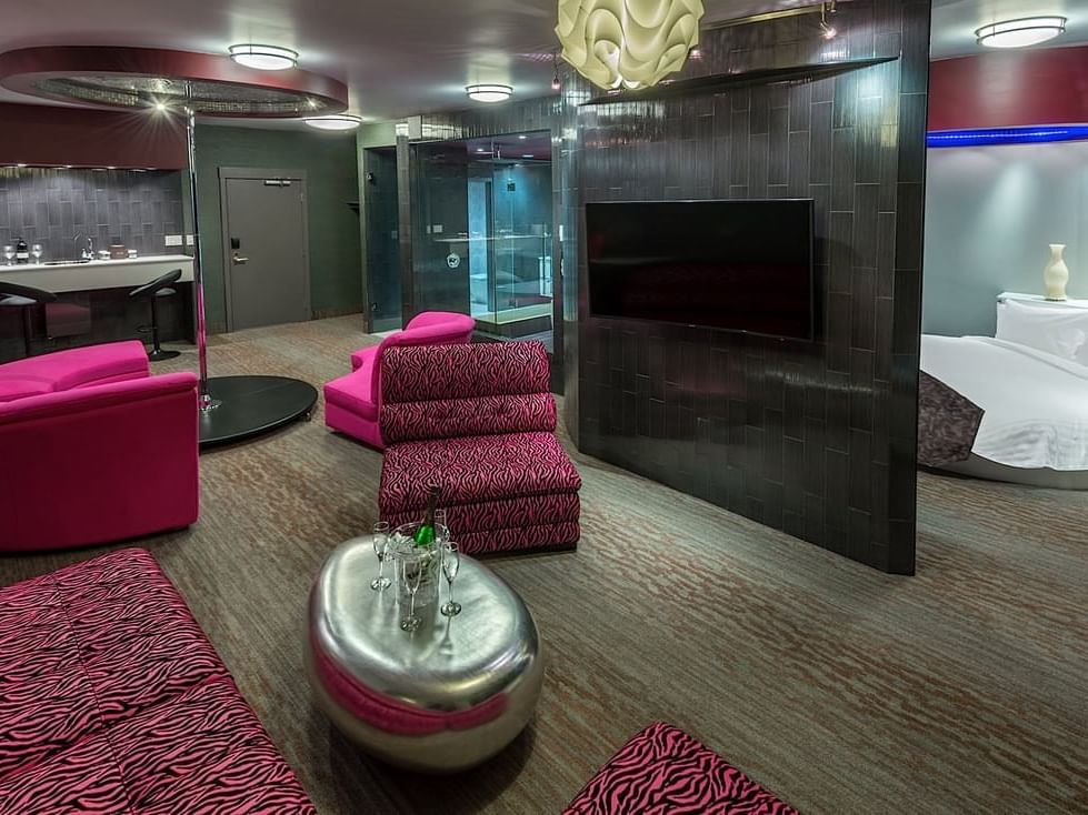 Living area in Taboo Themed Suite at Hotel Clique Calgary Airport