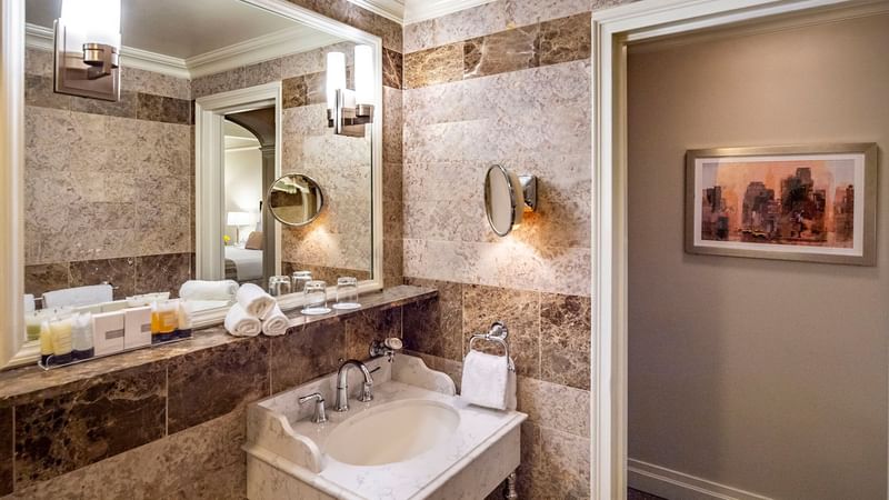 Bathroom vanity and towels in Premier Room at Warwick New York
