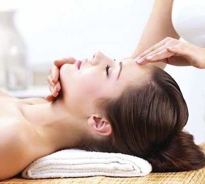 Lady receiving a facial treatment at the spa in Mundo Imperial