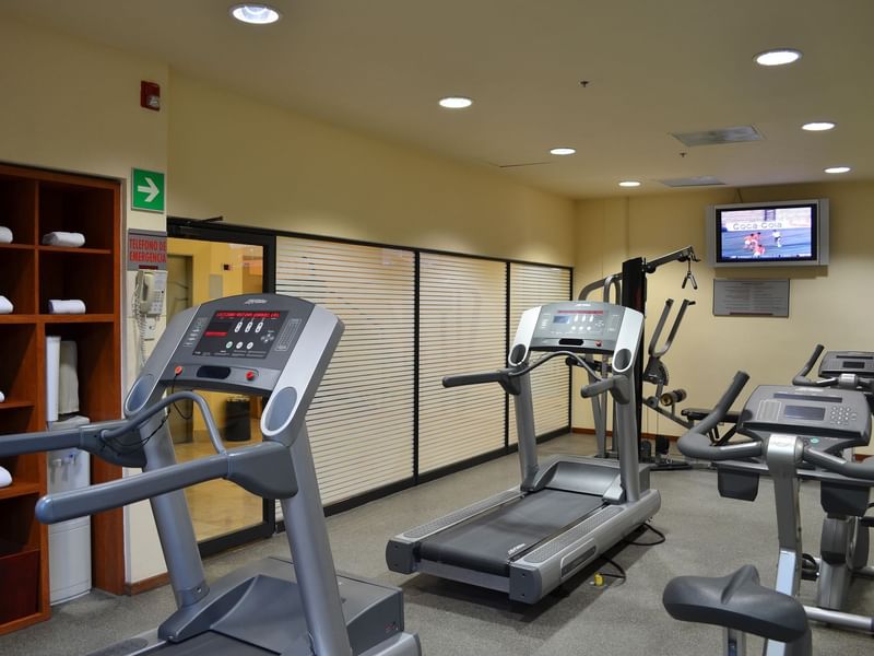 Exercise machines in a Gym Wellness Center at Fiesta Inn Hotels