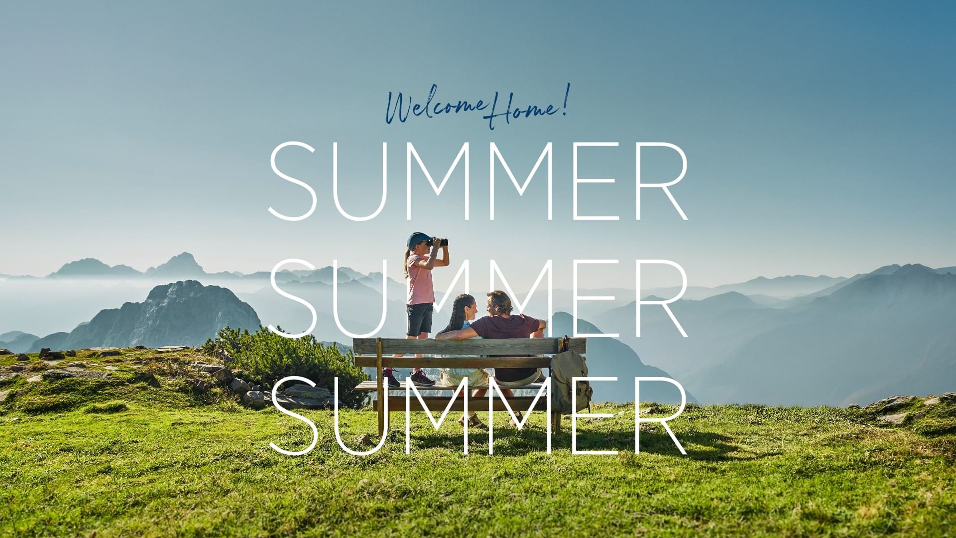 Family enjoying view on a bench with SUMMER text at Falkensteiner Group