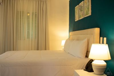 Inviting Superior Room at La Casita by the Hub, a prime choice for where to stay in La Romana, with a comfy bed