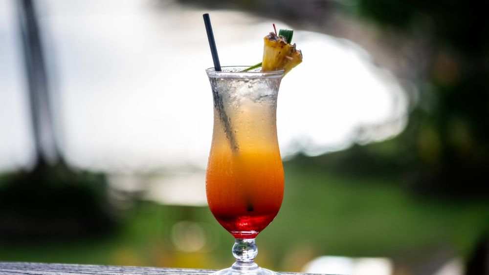 Tropical cocktail with a pineapple garnish at Sunset Bar in Korolevu at The Naviti Resort.
