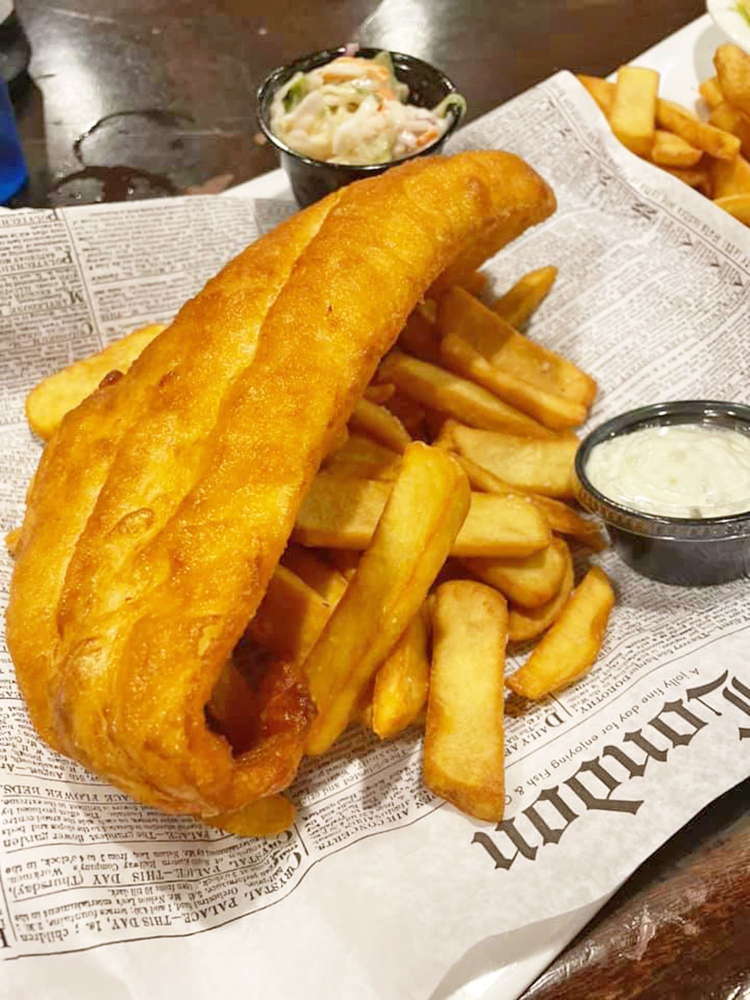 Fish chips served in Frankie Farrell’s Irish Pub & Grille at Lake Buena Vista Resort Village & Spa
